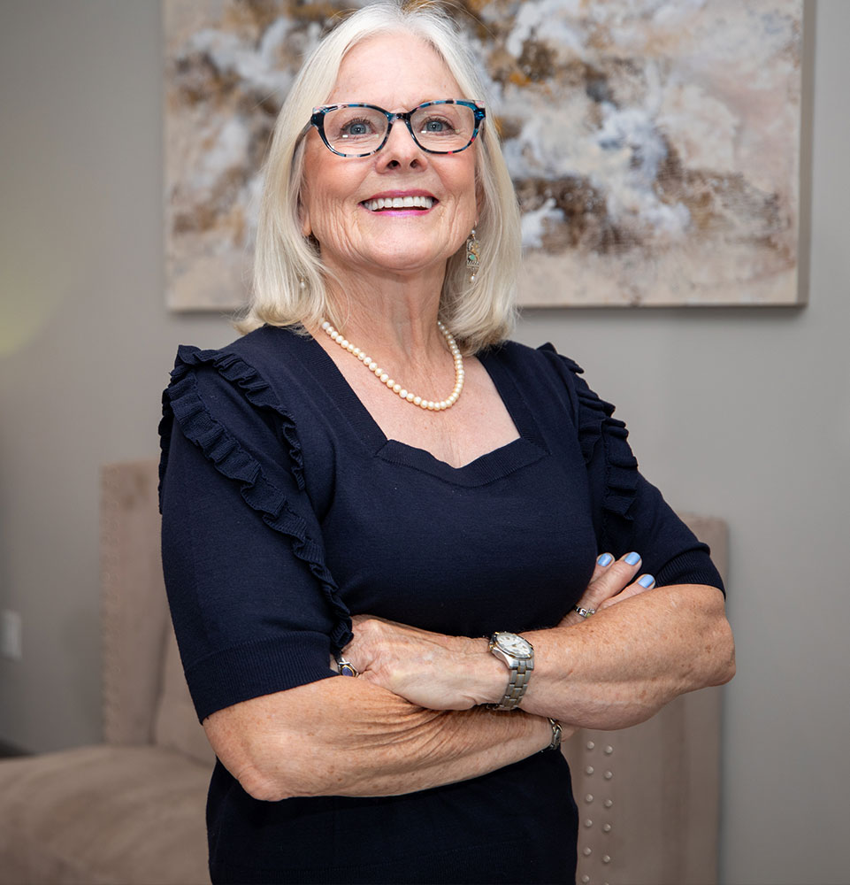 headshot of patient smiling within the dental center